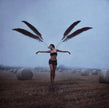 With brave wings she flies